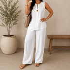 Conjunto Lucienne™ Blusa com Decote de Abertura Frontal e Calça Pantalona
Conjunto Lucienne™ Blusa com Decote de Abertura
Conjunto Lucienne